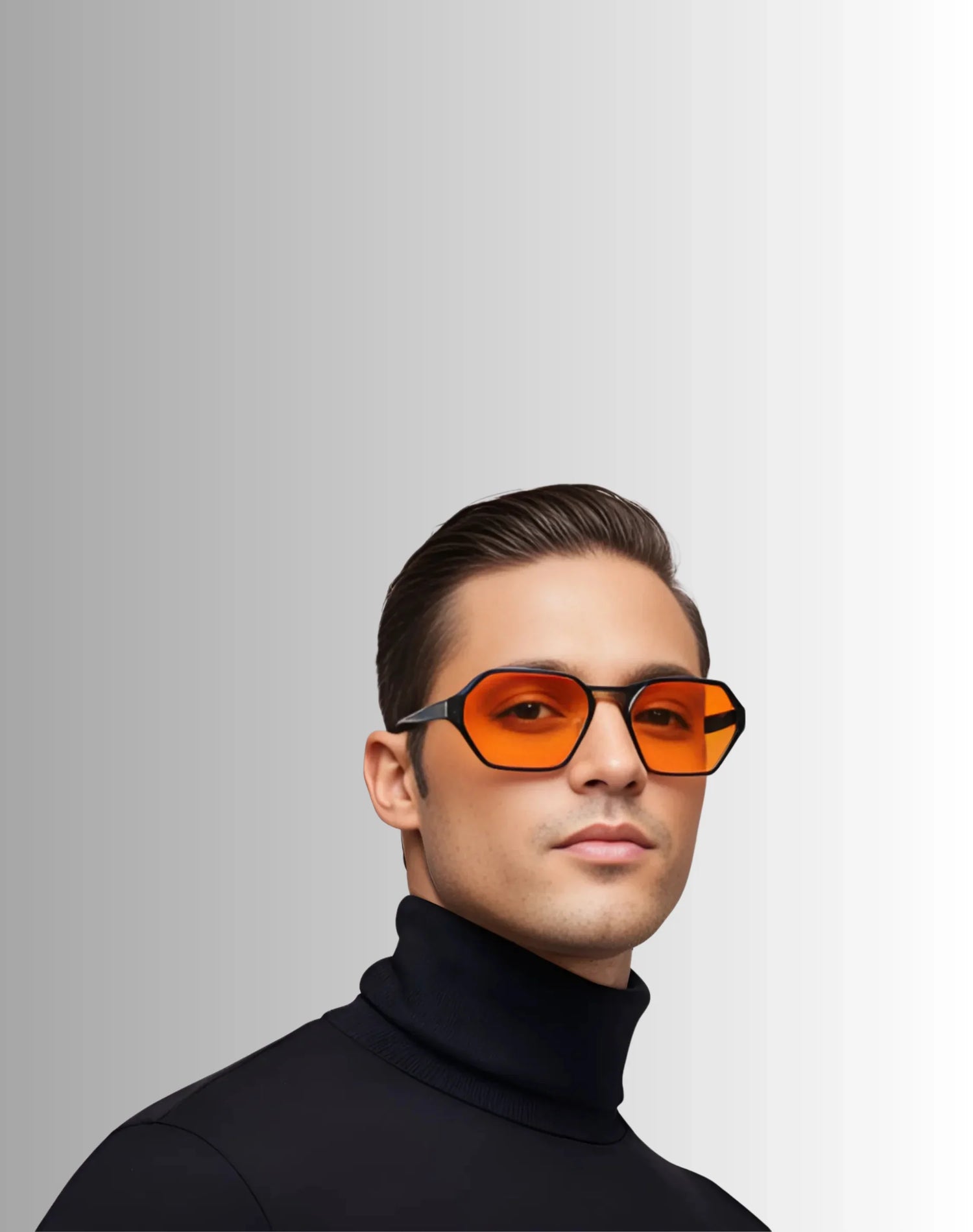 Man wearing orange-tinted sunglasses against a gray background